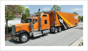 Berger Allied moving truck in front of residence